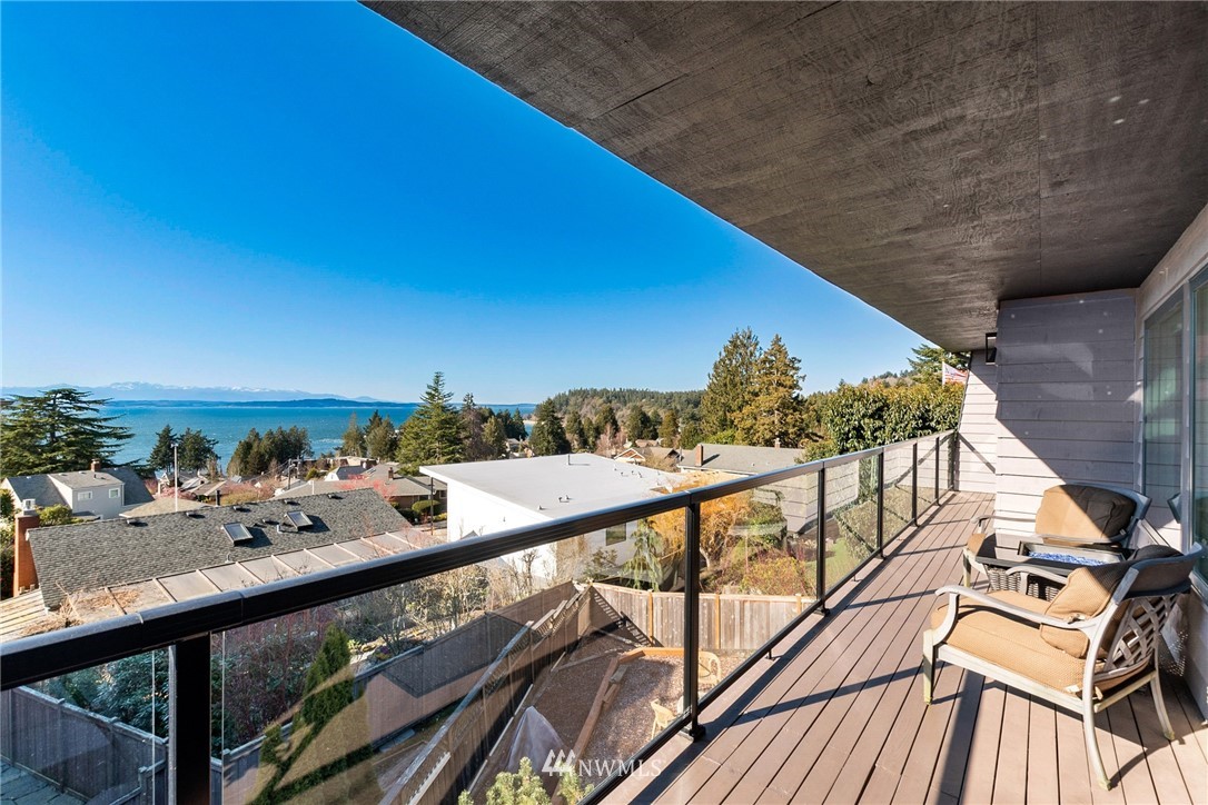 9337 45th Avenue Southwest Seattle, WA 98136 - Photo 21 of 30 a view of a balcony with an outdoor seating