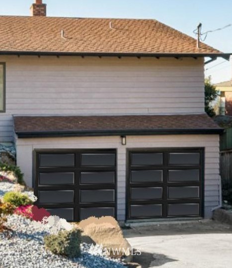 9337 45th Avenue Southwest Seattle, WA 98136 - Photo 27 of 30 a black and white building with a large window