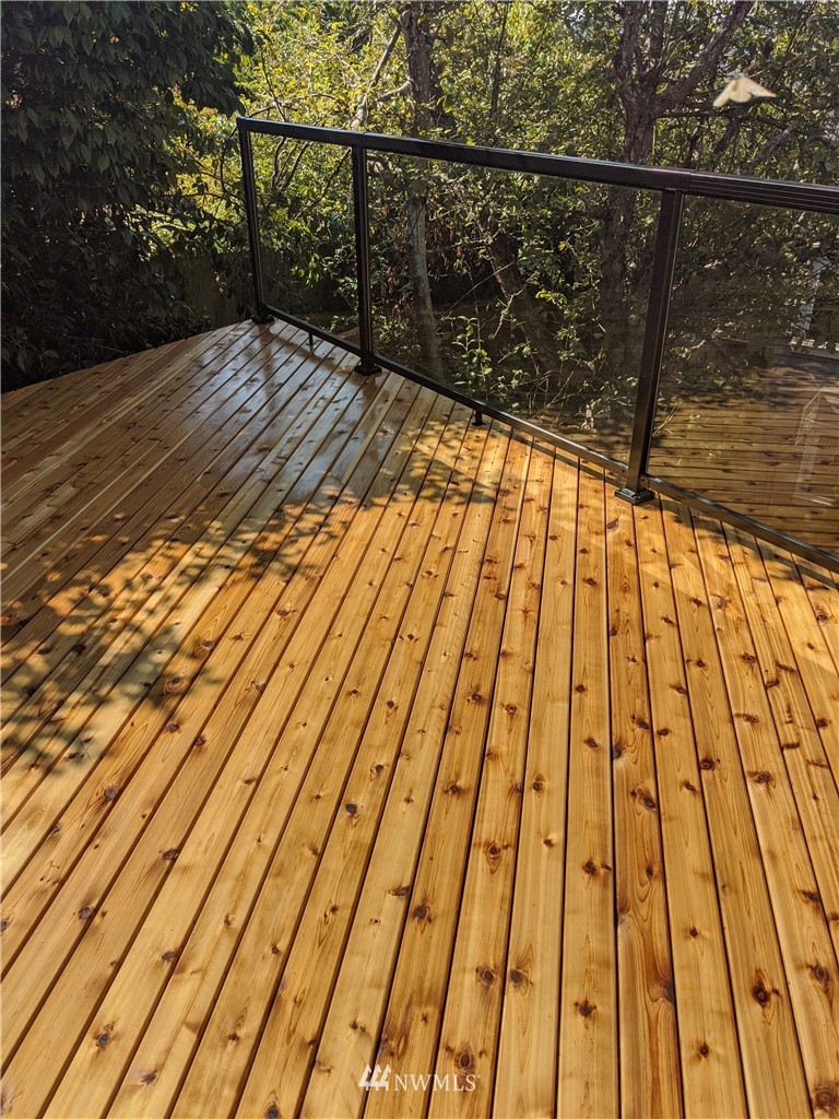 9337 45th Avenue Southwest Seattle, WA 98136 - Photo 30 of 30 a view of balcony with wooden floor