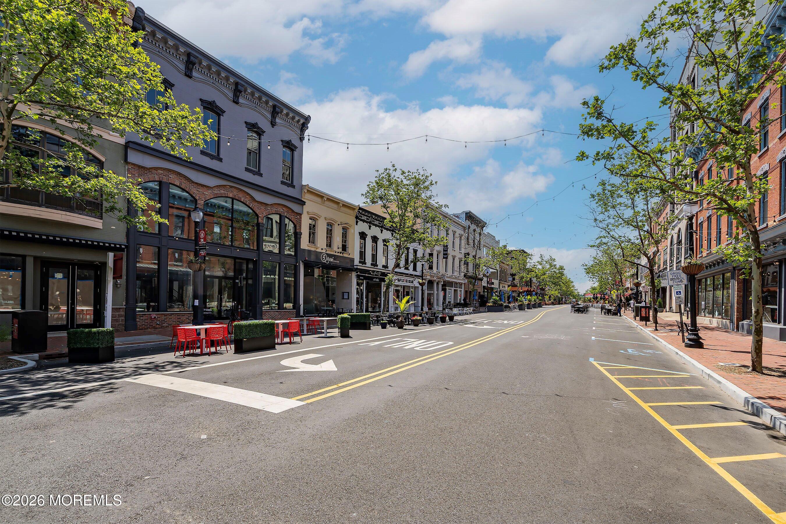 83 Manor Drive Red Bank, NJ 07701 - Photo 15 of 16 a view of a street with cars