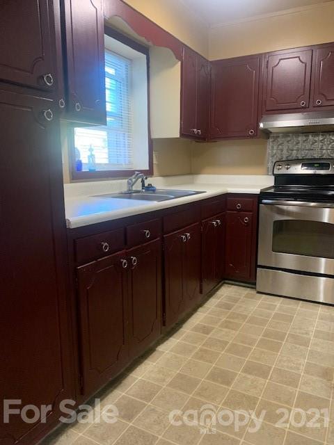 916 McAlway Road Charlotte, NC 28211 - Photo 3 of 9 a kitchen with a sink and cabinets