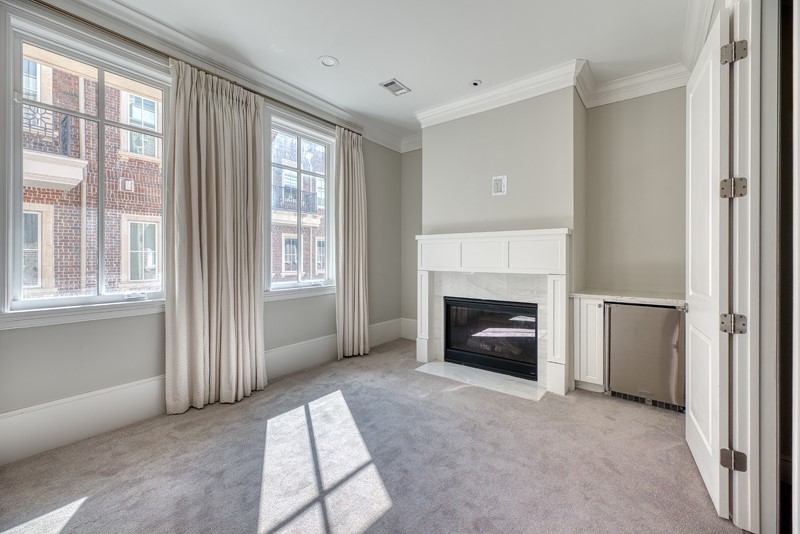 1913 Revere Street Houston, TX 77019 - Photo 17 of 40 a view of a livingroom with a fireplace and window