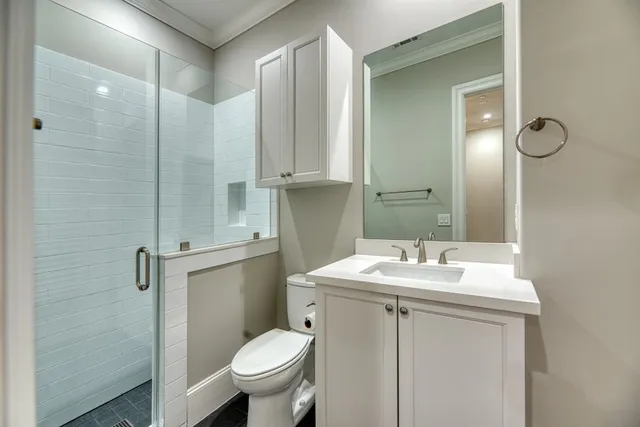 a bathroom with a bathtub and shower