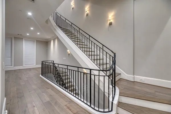 a view of entryway with wooden floor