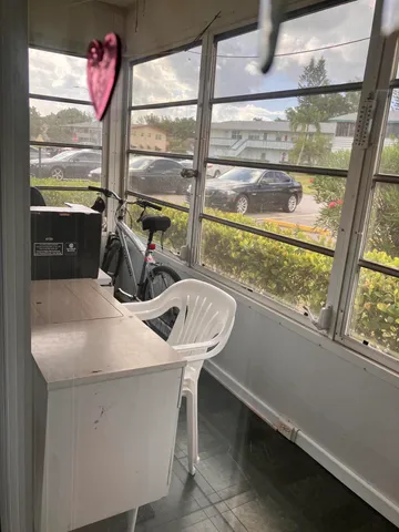 a bathroom with a sink and a window
