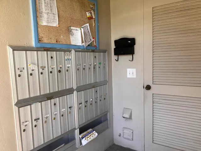 a view of a hallway and wooden floor windows