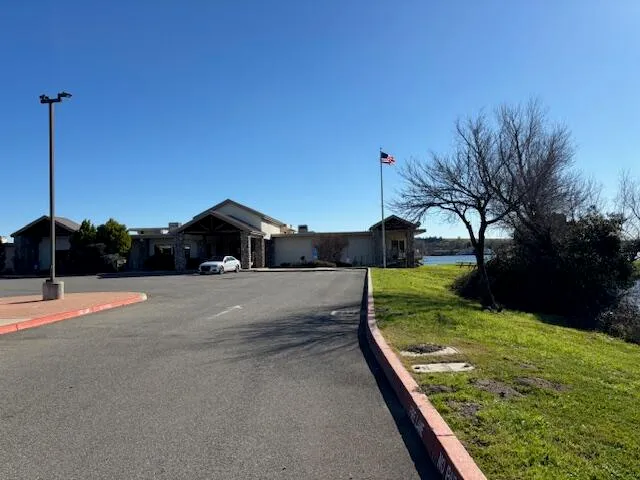 a backyard of a house with lots of green space