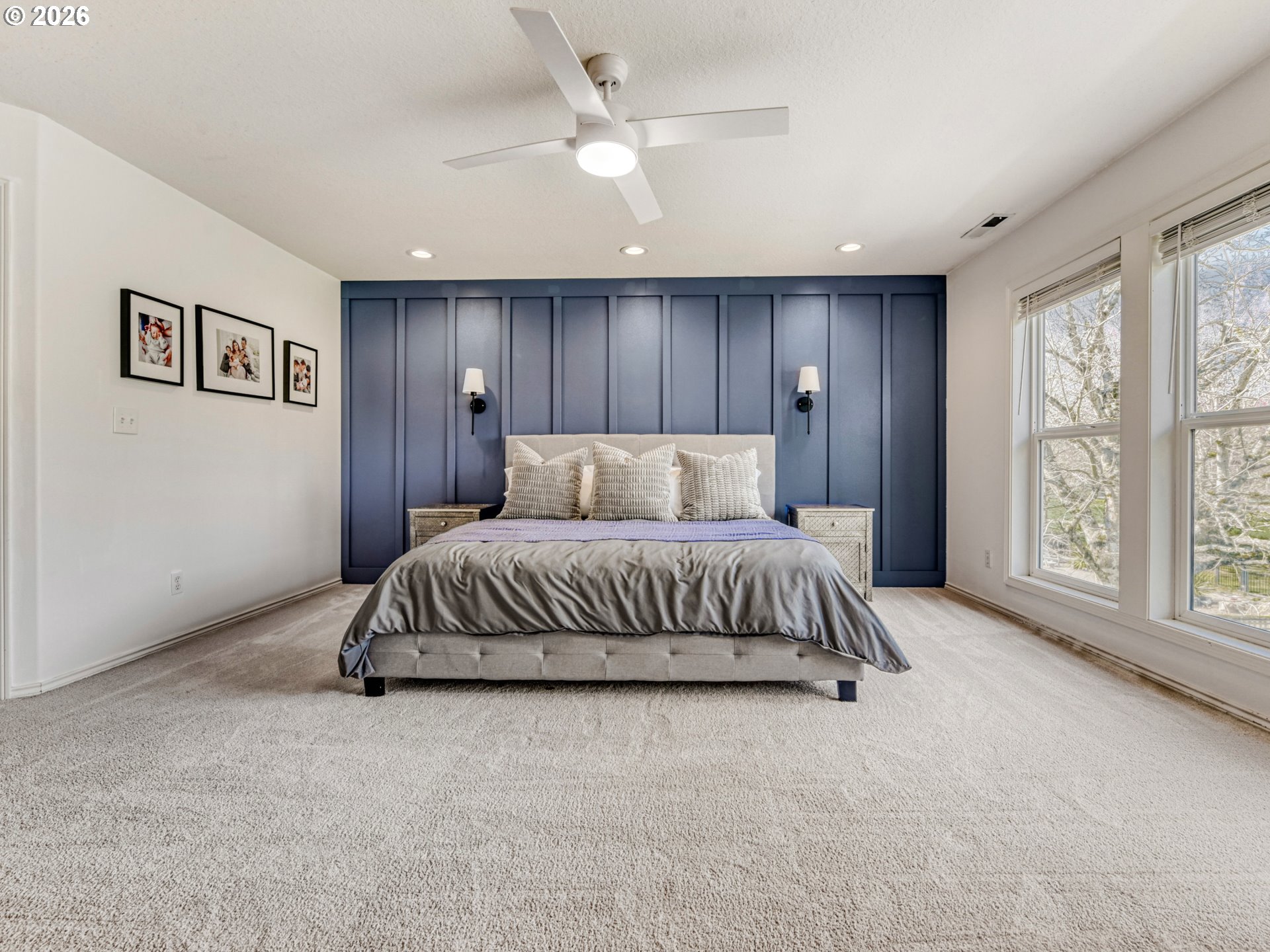 10979 Southwest Matzen Drive Wilsonville, OR 97070 - Photo 15 of 37 a bedroom with a large bed and a chandelier