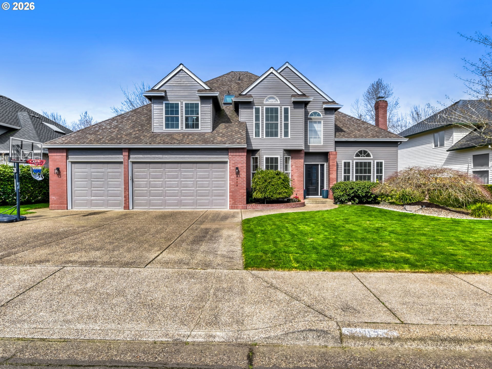 10979 Southwest Matzen Drive Wilsonville, OR 97070 - Photo 2 of 37 front view of a house with a yard