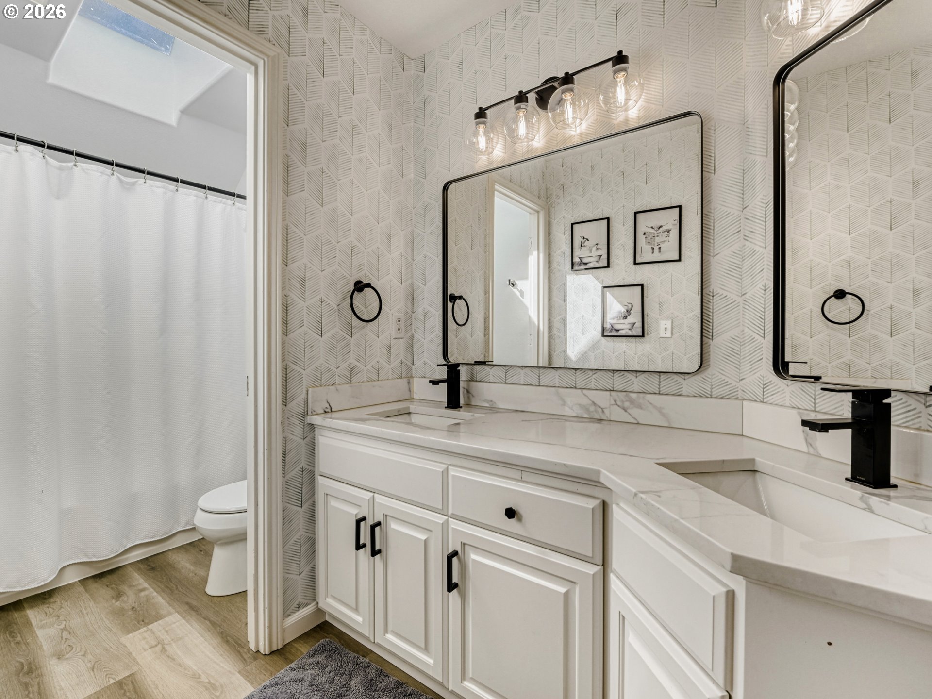 10979 Southwest Matzen Drive Wilsonville, OR 97070 - Photo 21 of 37 a bathroom with a sink and a mirror