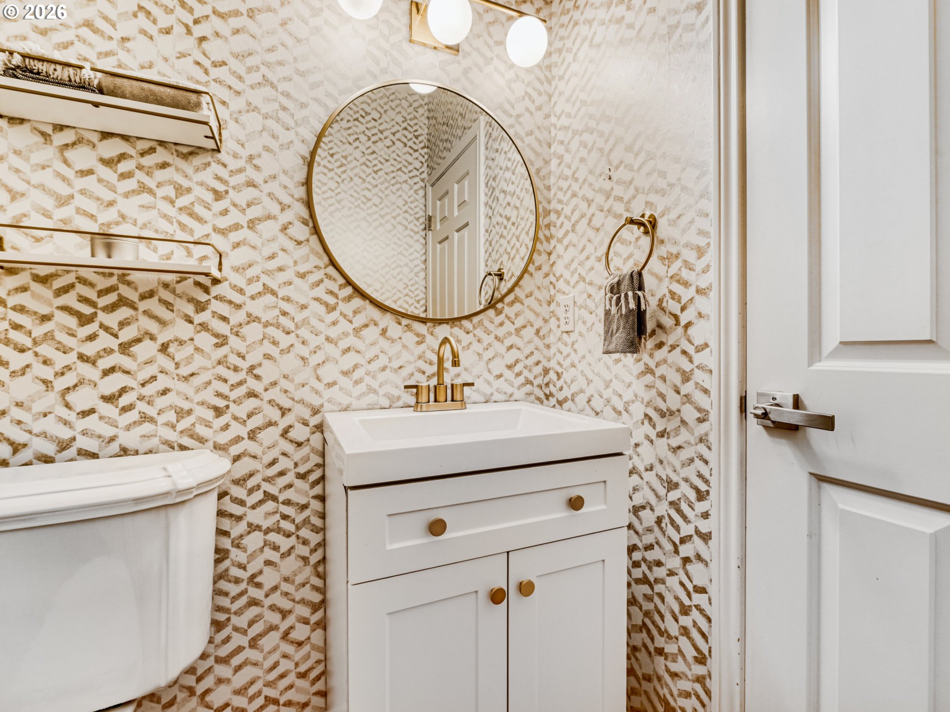 10979 Southwest Matzen Drive Wilsonville, OR 97070 - Photo 23 of 37 a bathroom with a sink a toilet and a mirror