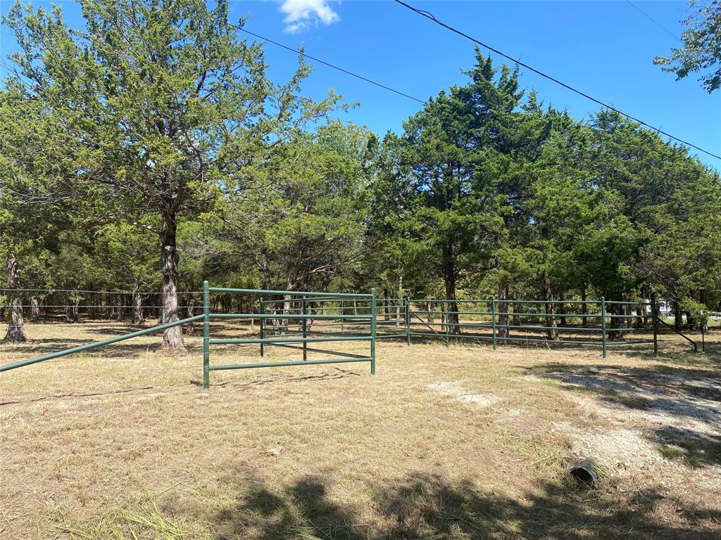 1648 Gordonville Road Gordonville, TX 76245 - Photo 6 of 18 a view of outdoor space with swimming pool and lounge chair