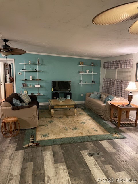 130 H H Burch Road Oak Hill, FL 32759 - Photo 16 of 24 a living room with furniture and a flat screen tv