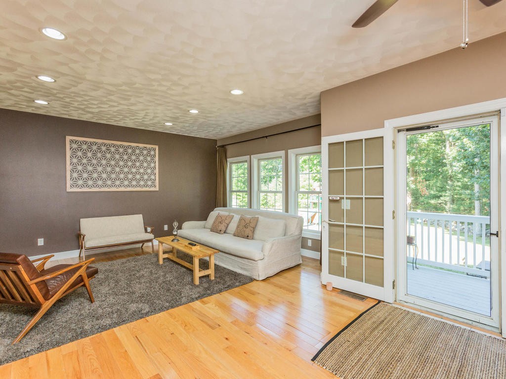17 Wilkes Road Rowley, MA 01969 - Photo 4 of 26 a living room with furniture and a window