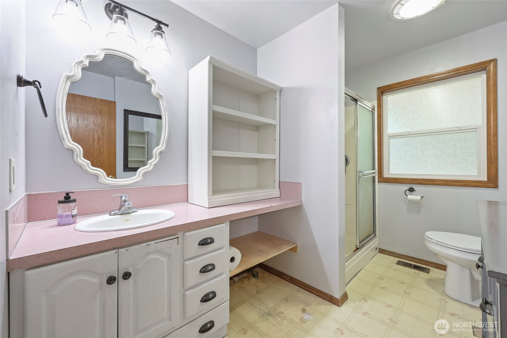 17215 Gibson Road Southwest Tenino, WA 98589 - Photo 22 of 40 a bathroom with a sink vanity and a mirror