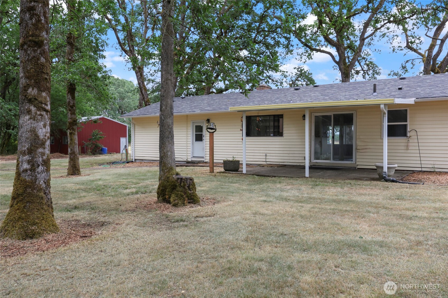 17215 Gibson Road Southwest Tenino, WA 98589 - Photo 29 of 40 front view of a house with a yard