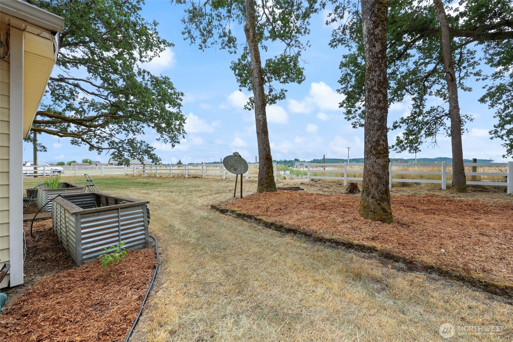17215 Gibson Road Southwest Tenino, WA 98589 - Photo 32 of 40 a view of a yard with iron fence