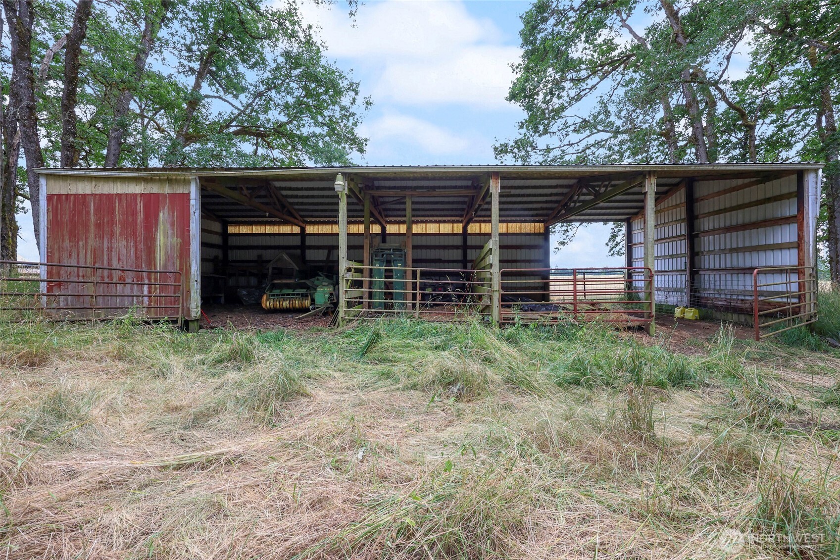 17215 Gibson Road Southwest Tenino, WA 98589 - Photo 33 of 40 a front view of a house with a backyard