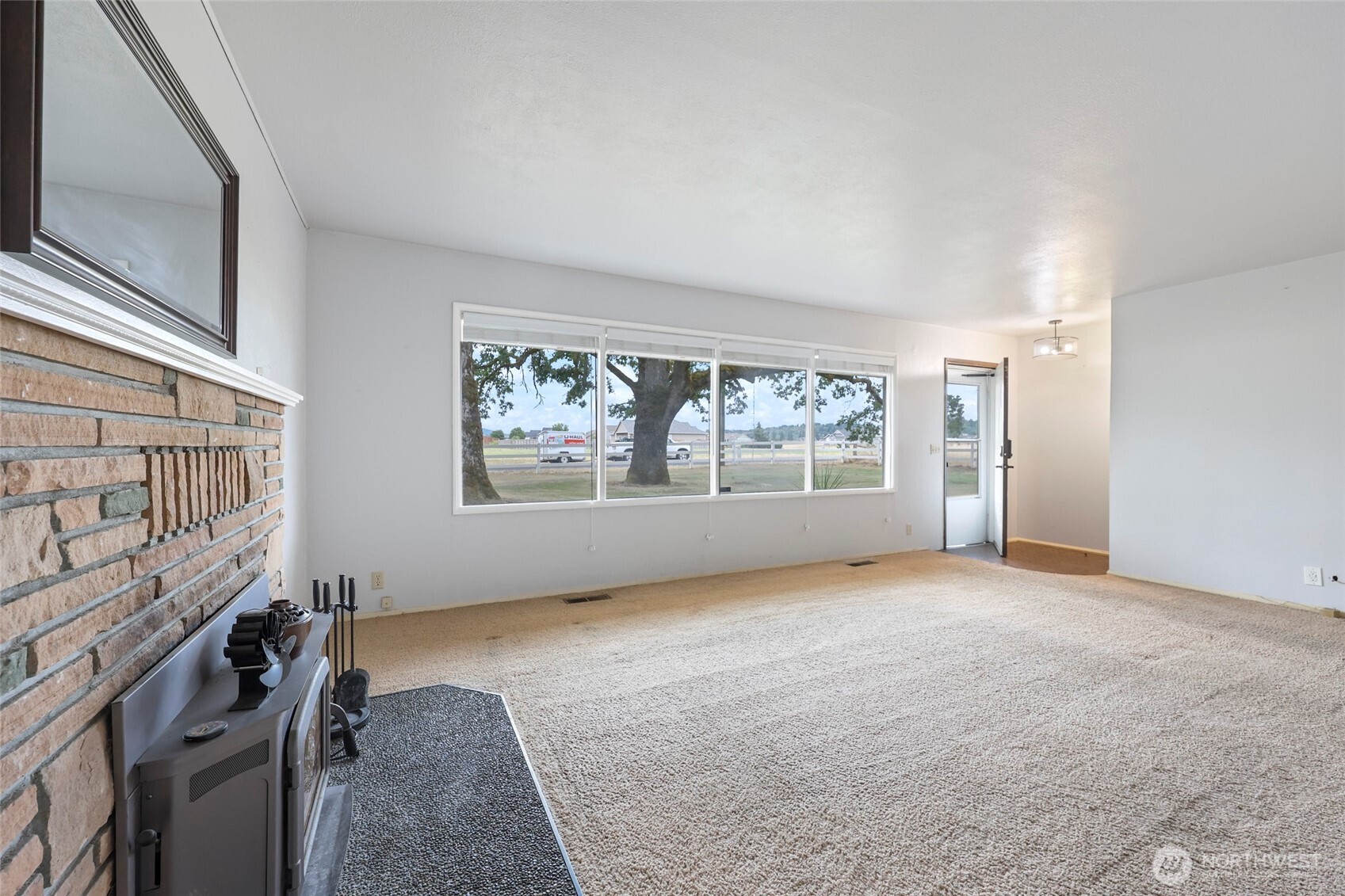 17215 Gibson Road Southwest Tenino, WA 98589 - Photo 8 of 40 an empty room with windows