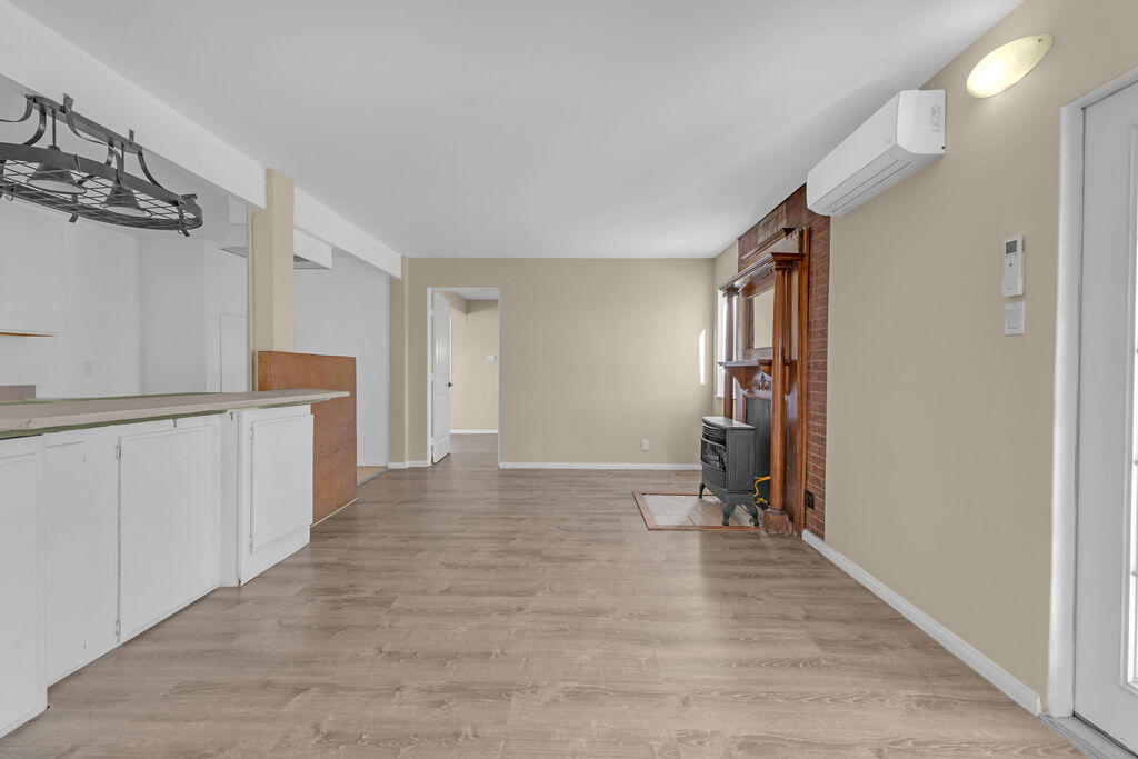 51088 Mecca Road Morongo Valley, CA 92256 - Photo 17 of 77 a view of empty room with wooden floor