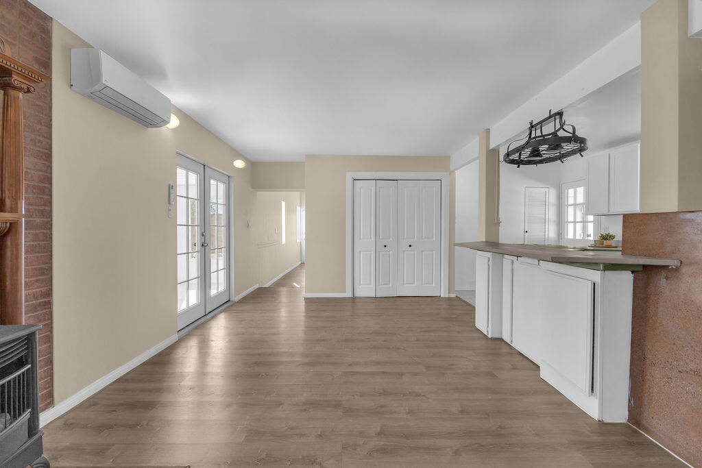 51088 Mecca Road Morongo Valley, CA 92256 - Photo 20 of 77 a view of a kitchen cabinets and wooden floor
