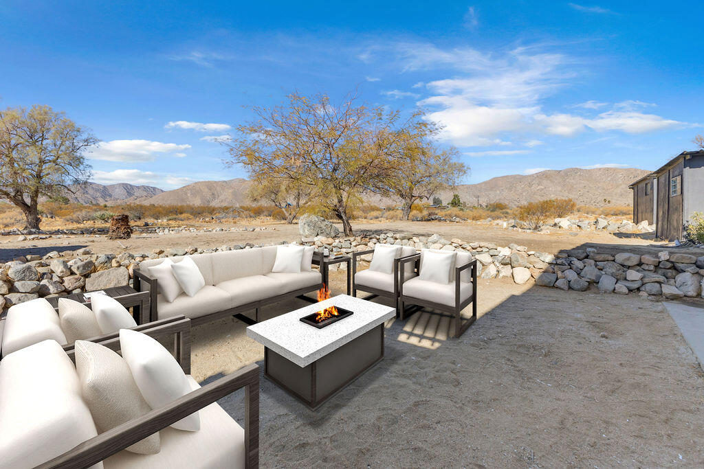 51088 Mecca Road Morongo Valley, CA 92256 - Photo 56 of 77 a view of a terrace with couches and city view