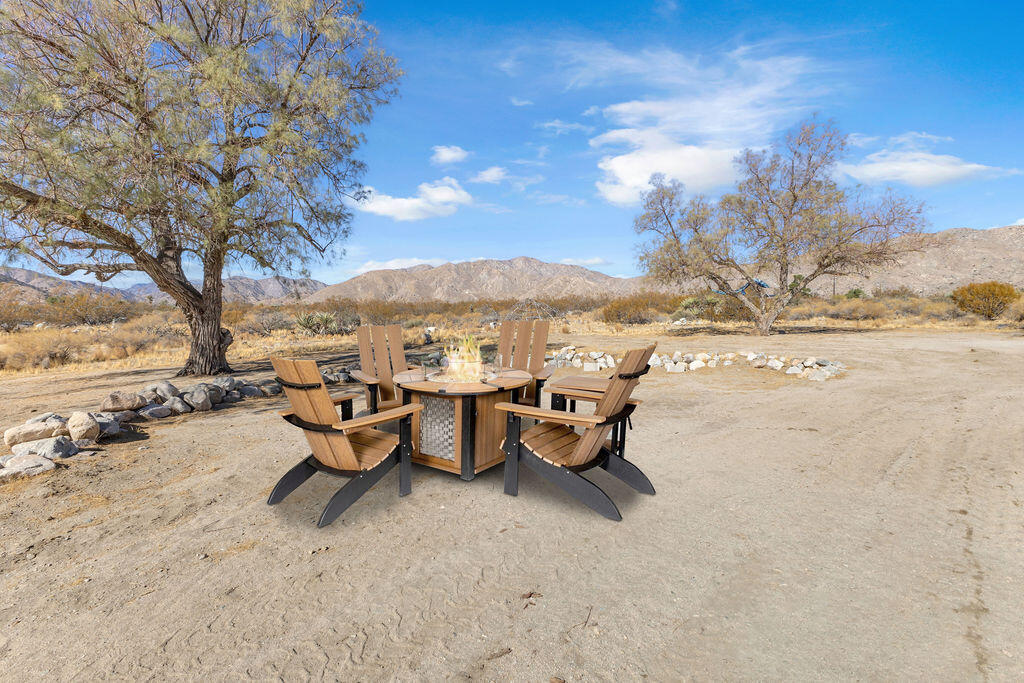 51088 Mecca Road Morongo Valley, CA 92256 - Photo 58 of 77 a view of a terrace with sitting area