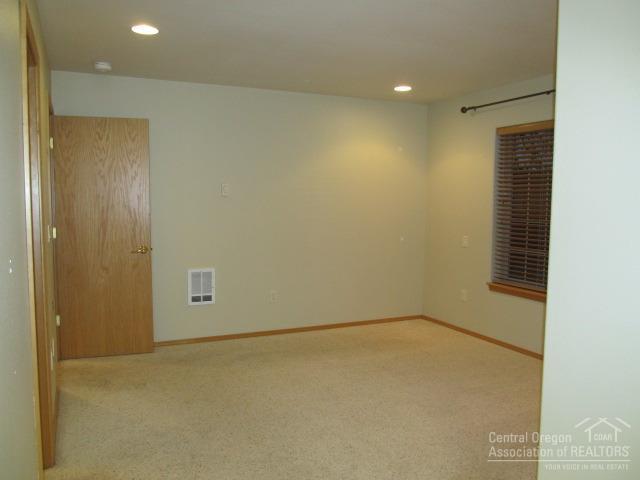 21626 Northeast Butler Market Road Bend, OR 97701 - Photo 12 of 23 a view of an empty room