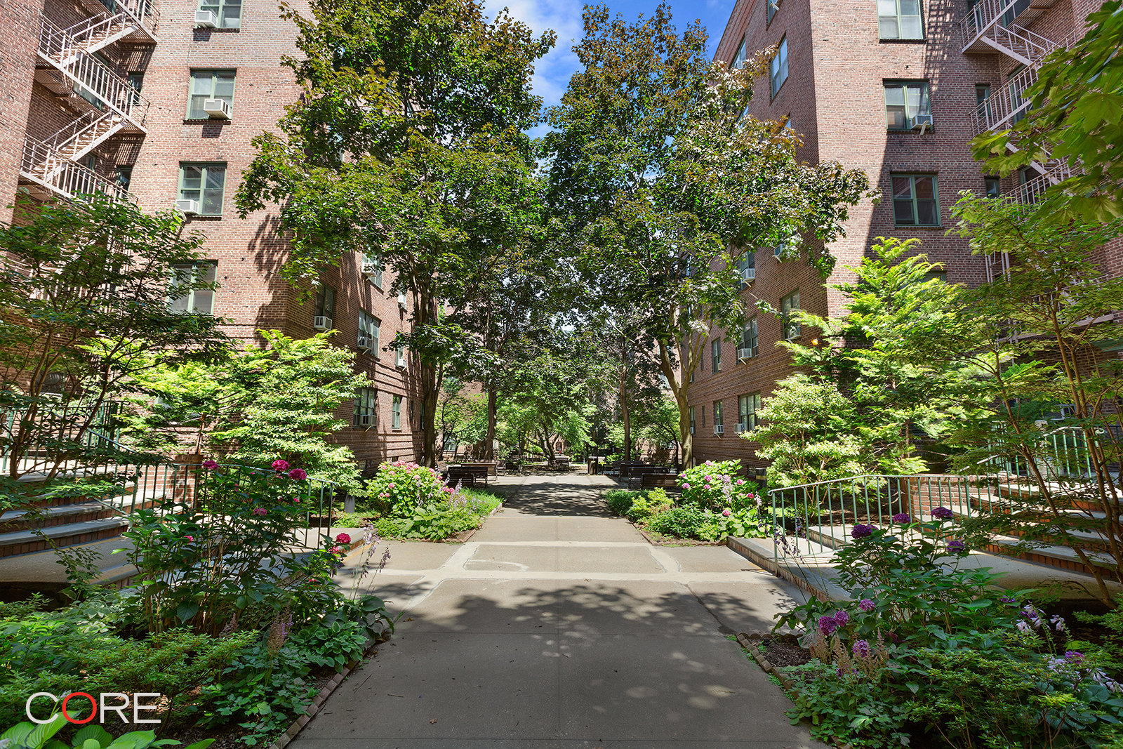 34-21 78th Street, Unit 2B Queens, NY 11372 - Photo 7 of 9 a pathway of a house with a yard