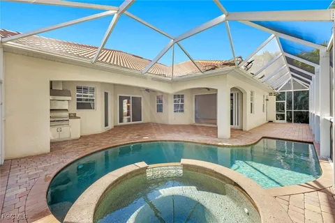 a house view with a swimming pool