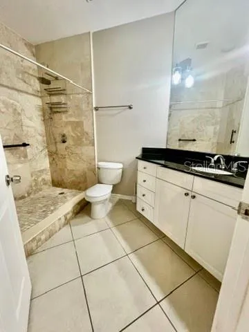 a view of an empty room with a sink