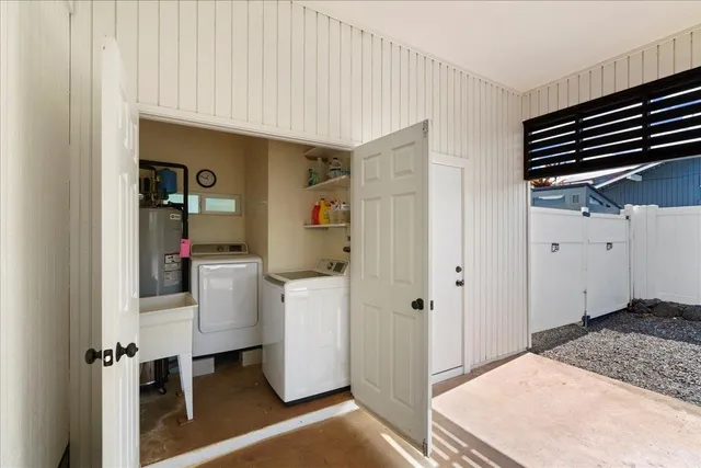 a view of hallway with washer and dryer