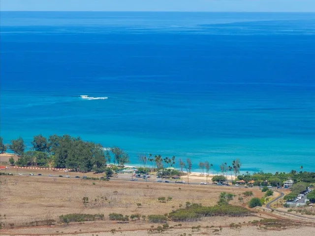 a view of a beach and a ocean view