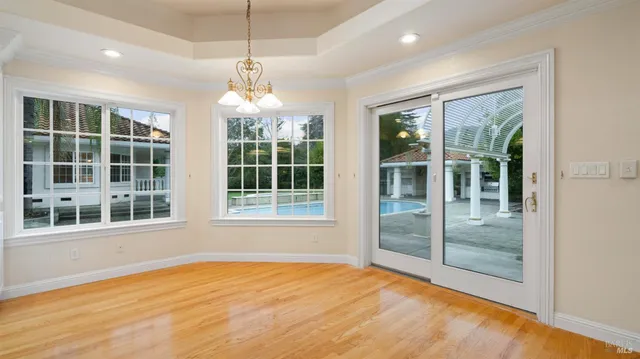 a kitchen with stainless steel appliances granite countertop a stove and a refrigerator