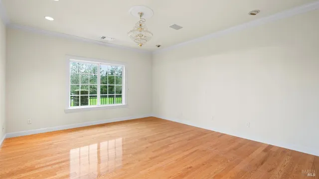 a kitchen with white cabinets
