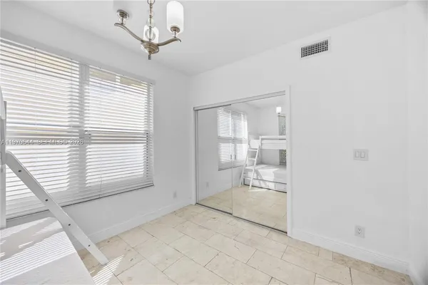 a view of a kitchen and a windows