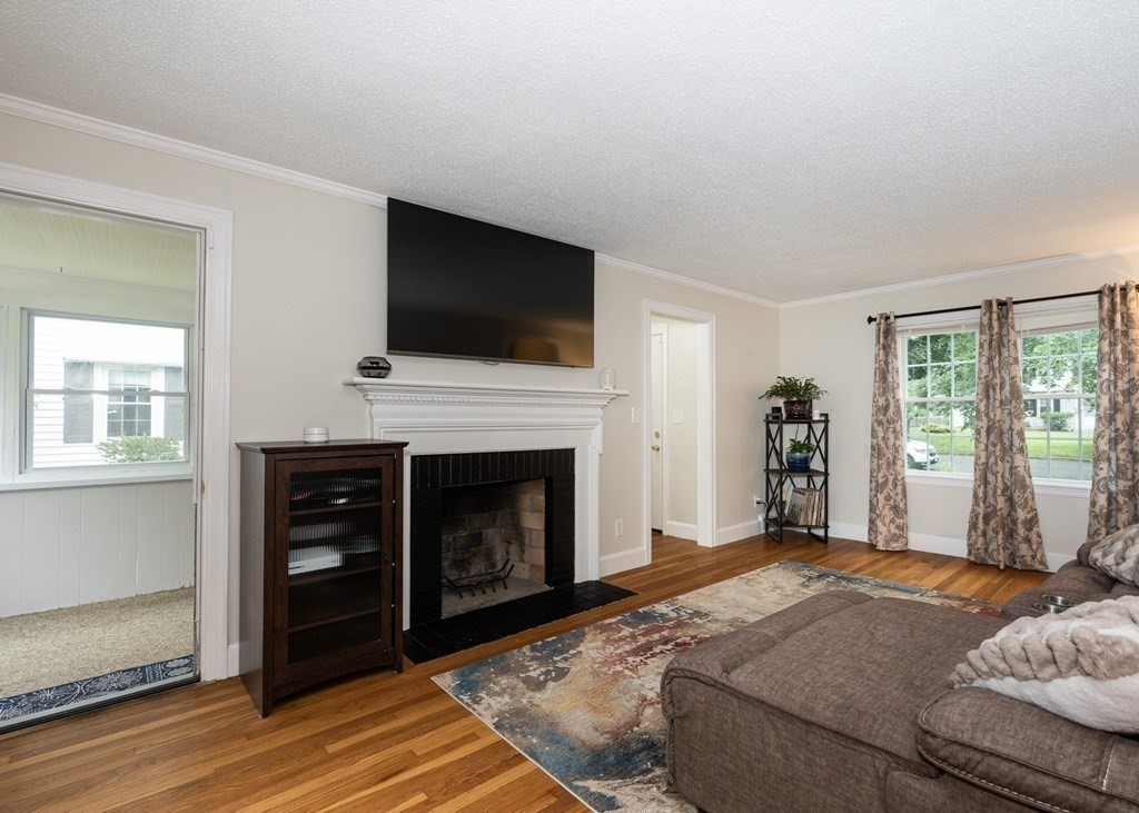 36 Mayfield Street Springfield, MA 01108 - Photo 5 of 34 a bedroom with a bed and a flat screen tv
