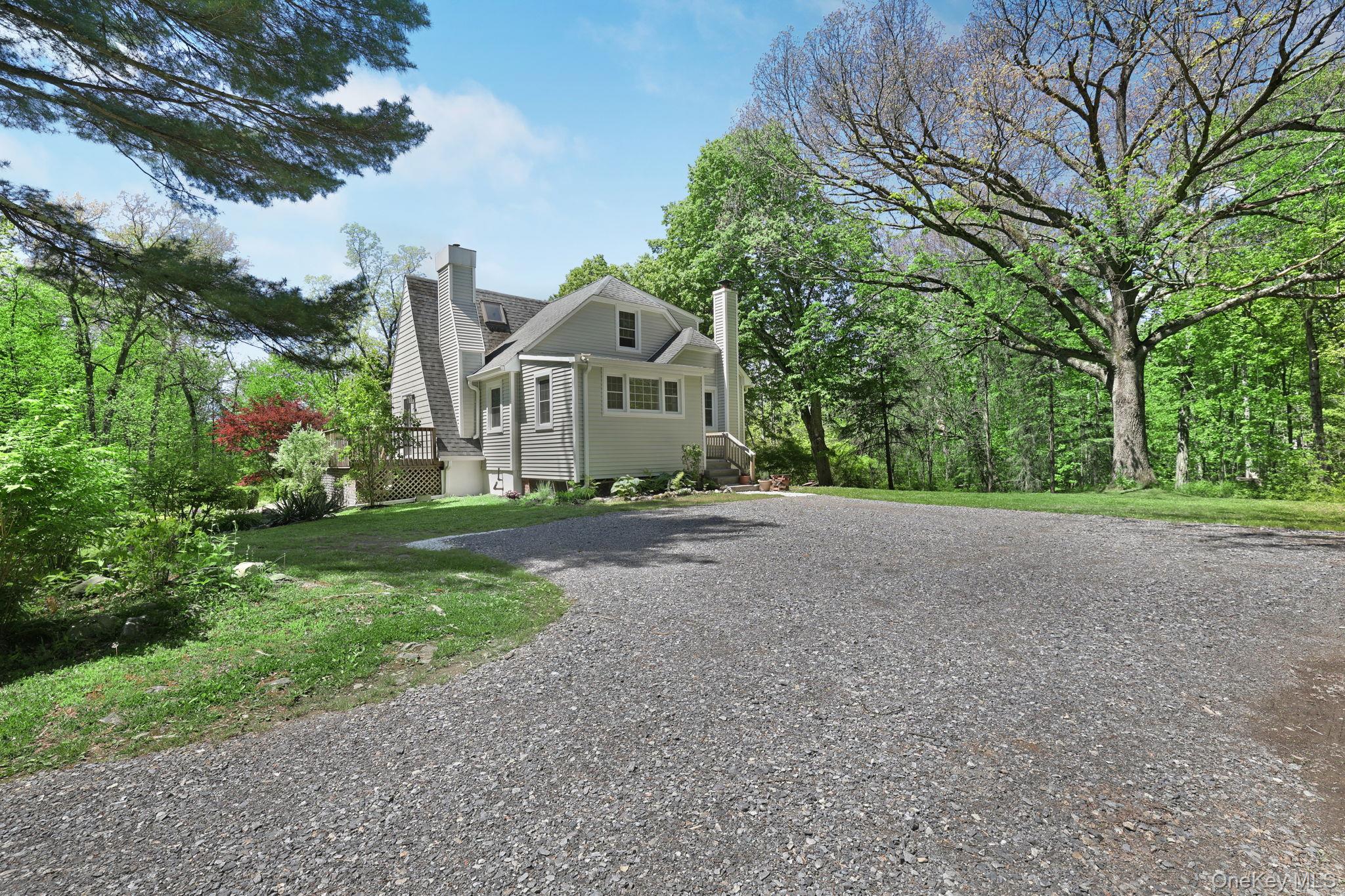 94 Smithtown Road Fishkill, NY 12524 - Photo 14 of 45 a view of a house with a big yard plants and large trees