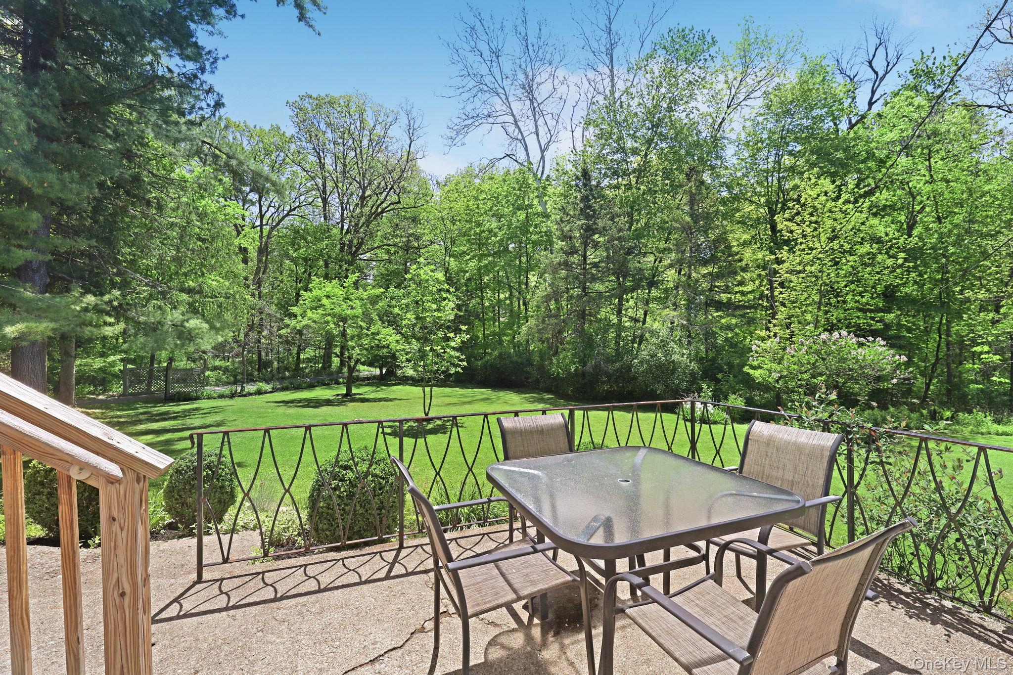 94 Smithtown Road Fishkill, NY 12524 - Photo 17 of 45 a balcony with a table and chairs