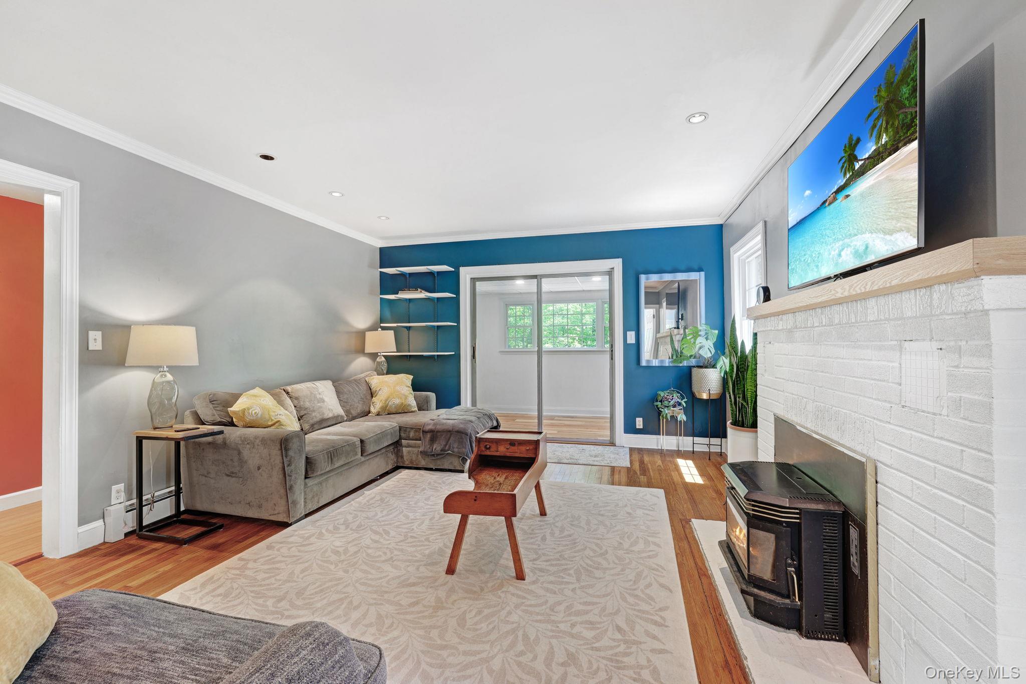 94 Smithtown Road Fishkill, NY 12524 - Photo 20 of 45 a living room with furniture and a fireplace