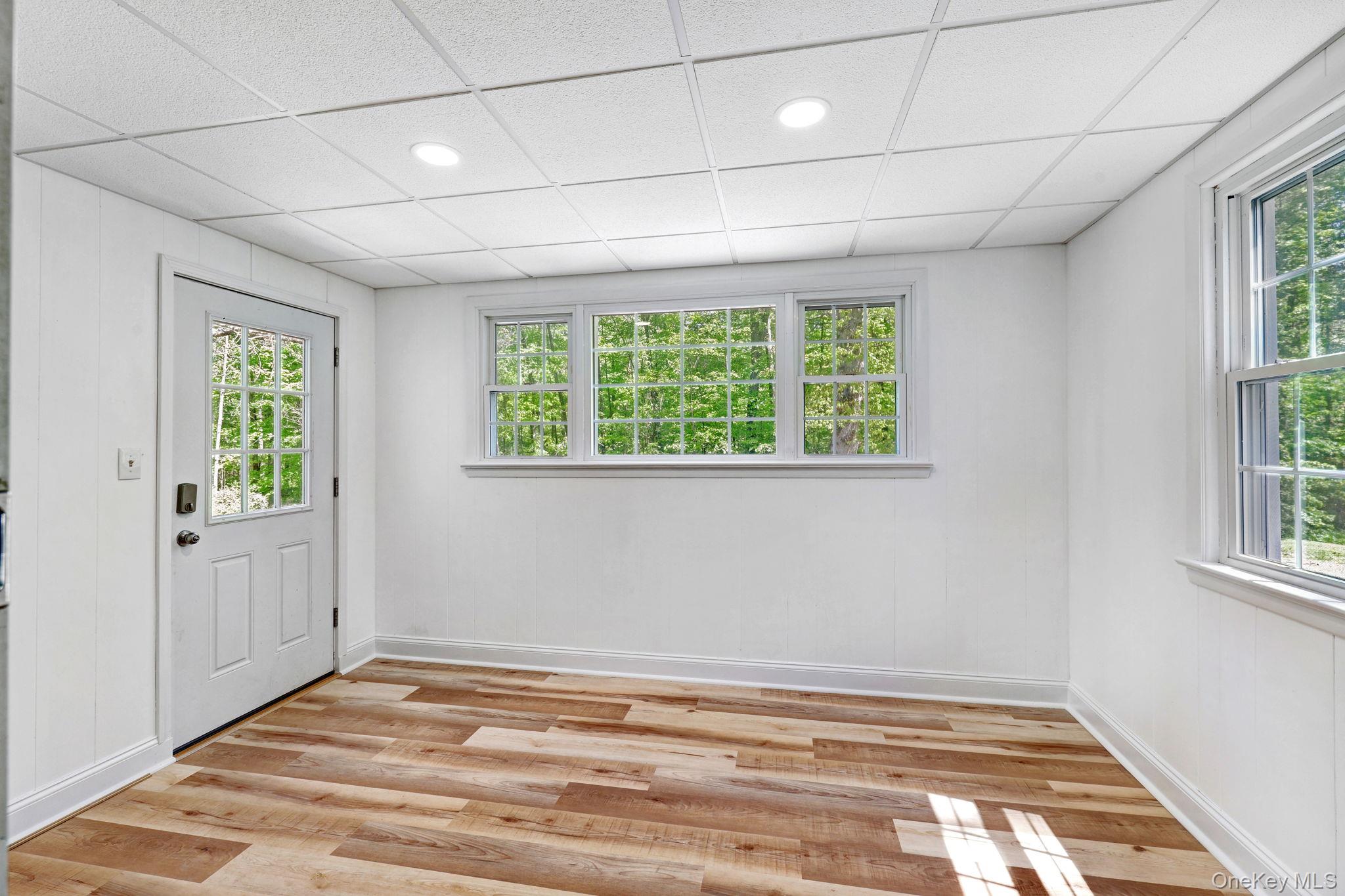 94 Smithtown Road Fishkill, NY 12524 - Photo 22 of 45 a view of a livingroom with an empty space & window