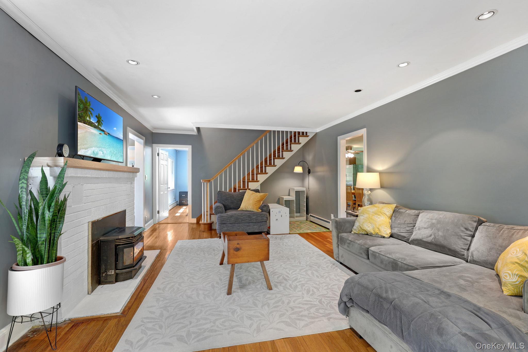 94 Smithtown Road Fishkill, NY 12524 - Photo 24 of 45 a living room with furniture and a fireplace