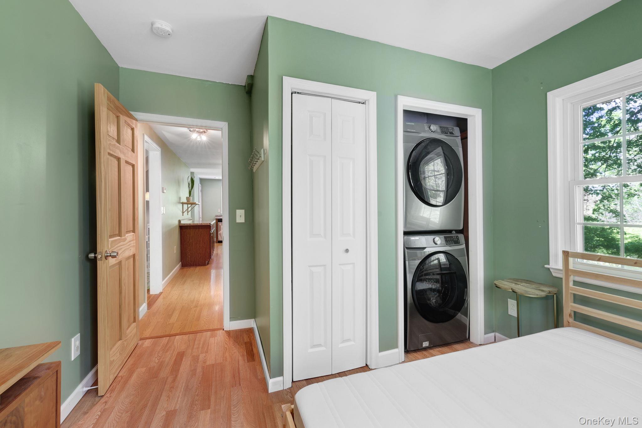 94 Smithtown Road Fishkill, NY 12524 - Photo 26 of 45 a view of a hallway with washer and dryer