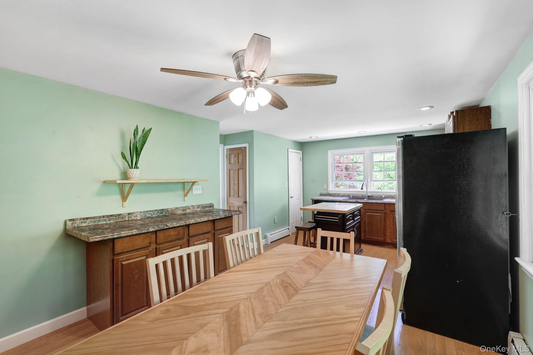 94 Smithtown Road Fishkill, NY 12524 - Photo 30 of 45 a bedroom with a bed and a refrigerator
