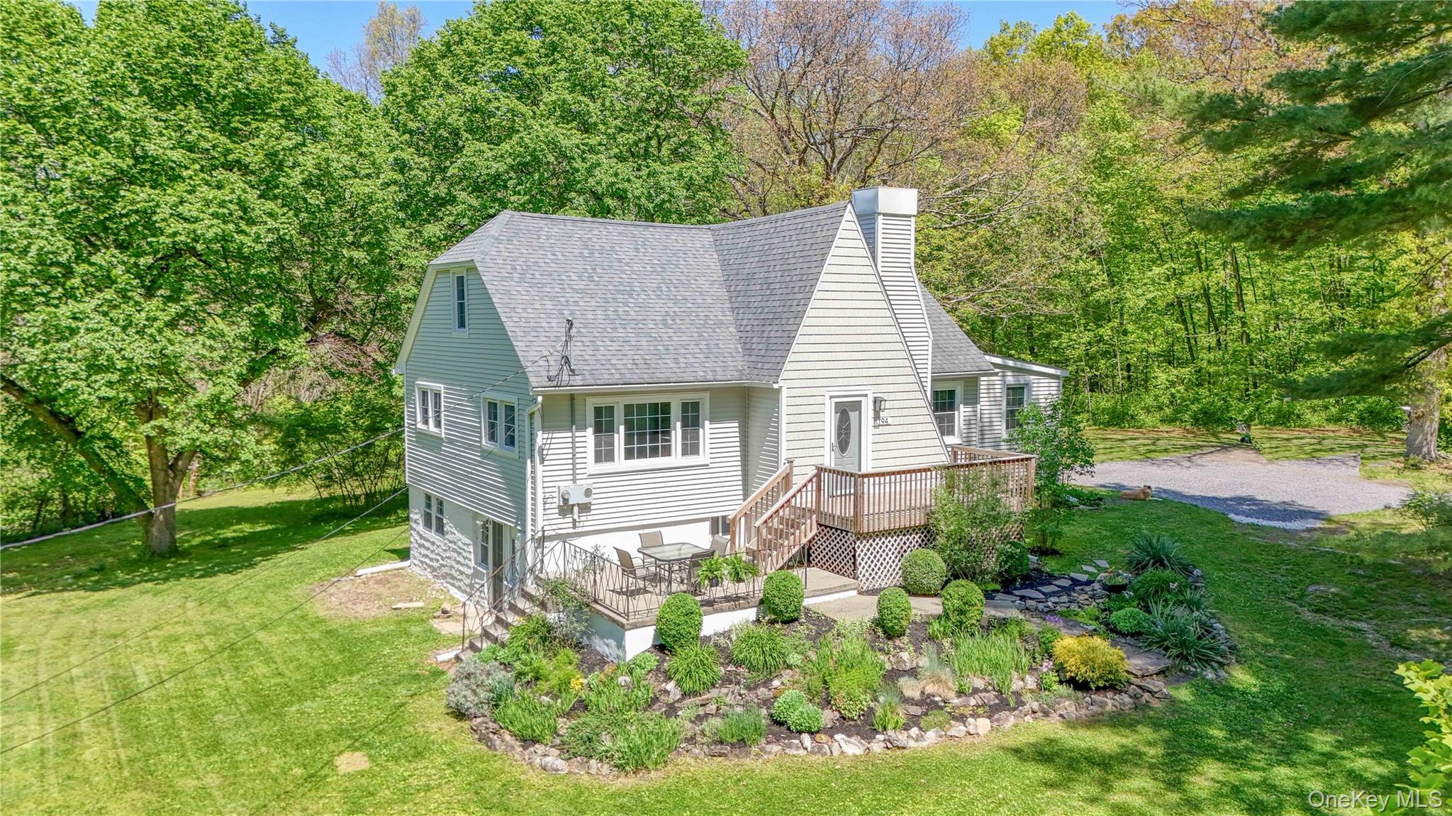94 Smithtown Road Fishkill, NY 12524 - Photo 3 of 45 a aerial view of a house with yard and sitting area