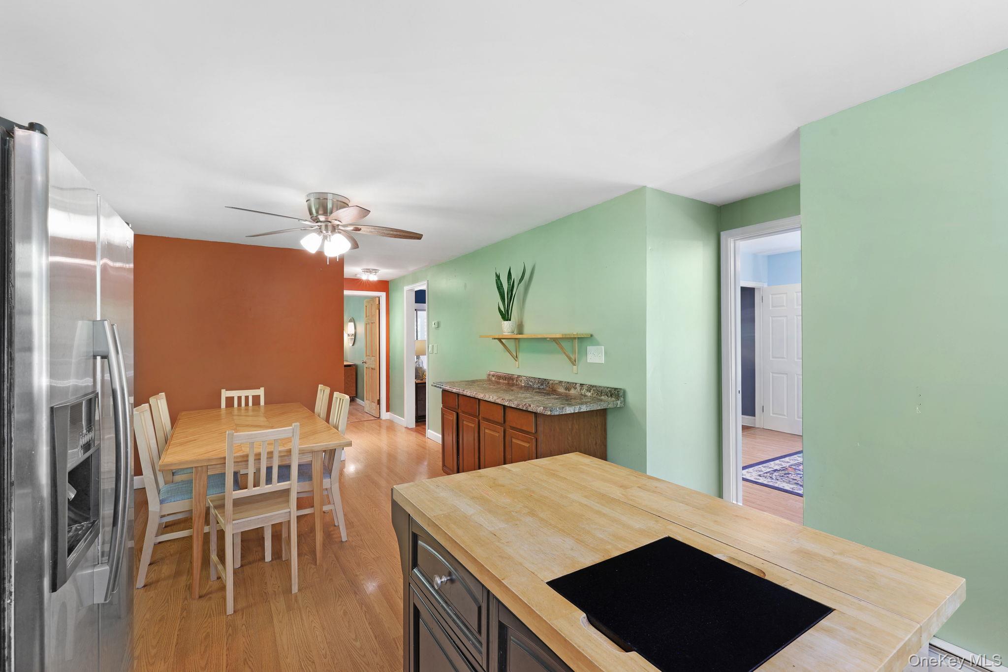 94 Smithtown Road Fishkill, NY 12524 - Photo 33 of 45 a large kitchen with a table and chairs