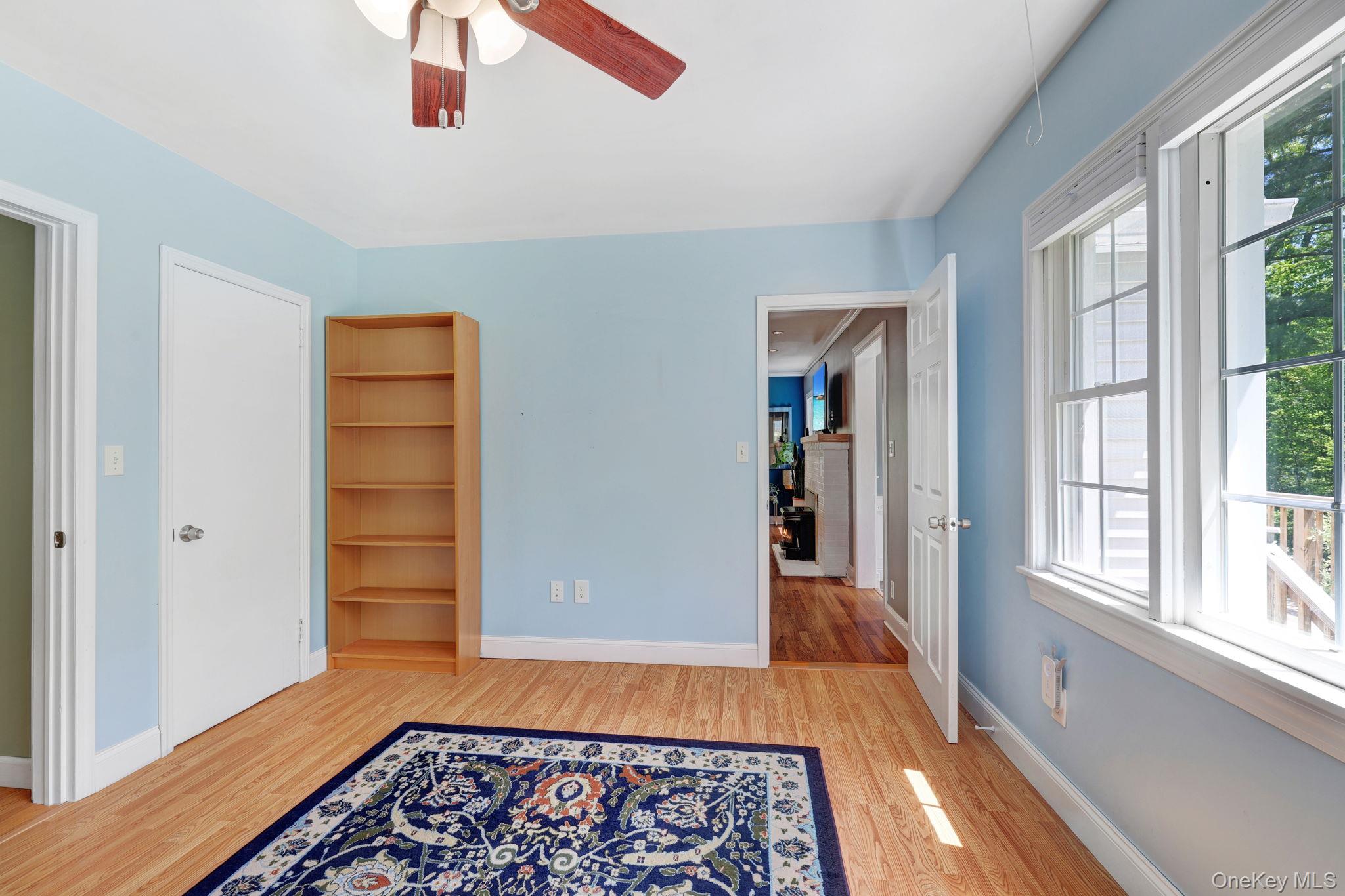 94 Smithtown Road Fishkill, NY 12524 - Photo 35 of 45 an entryway to room with wooden floor fan and windows