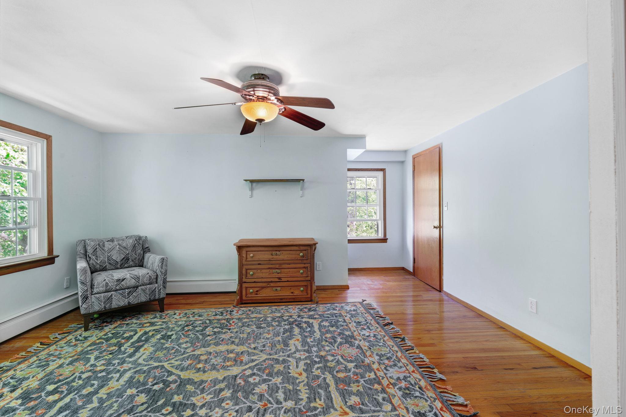 94 Smithtown Road Fishkill, NY 12524 - Photo 39 of 45 a living room with furniture and a rug