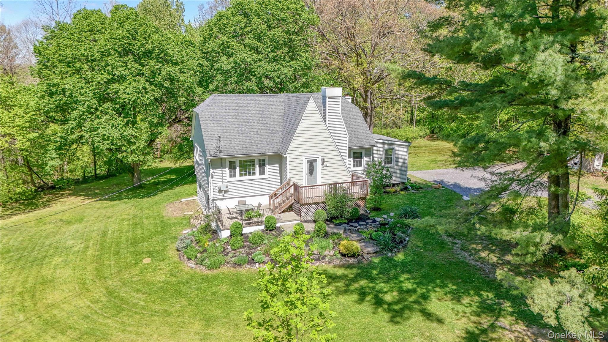 94 Smithtown Road Fishkill, NY 12524 - Photo 4 of 45 a aerial view of a house with yard and sitting area