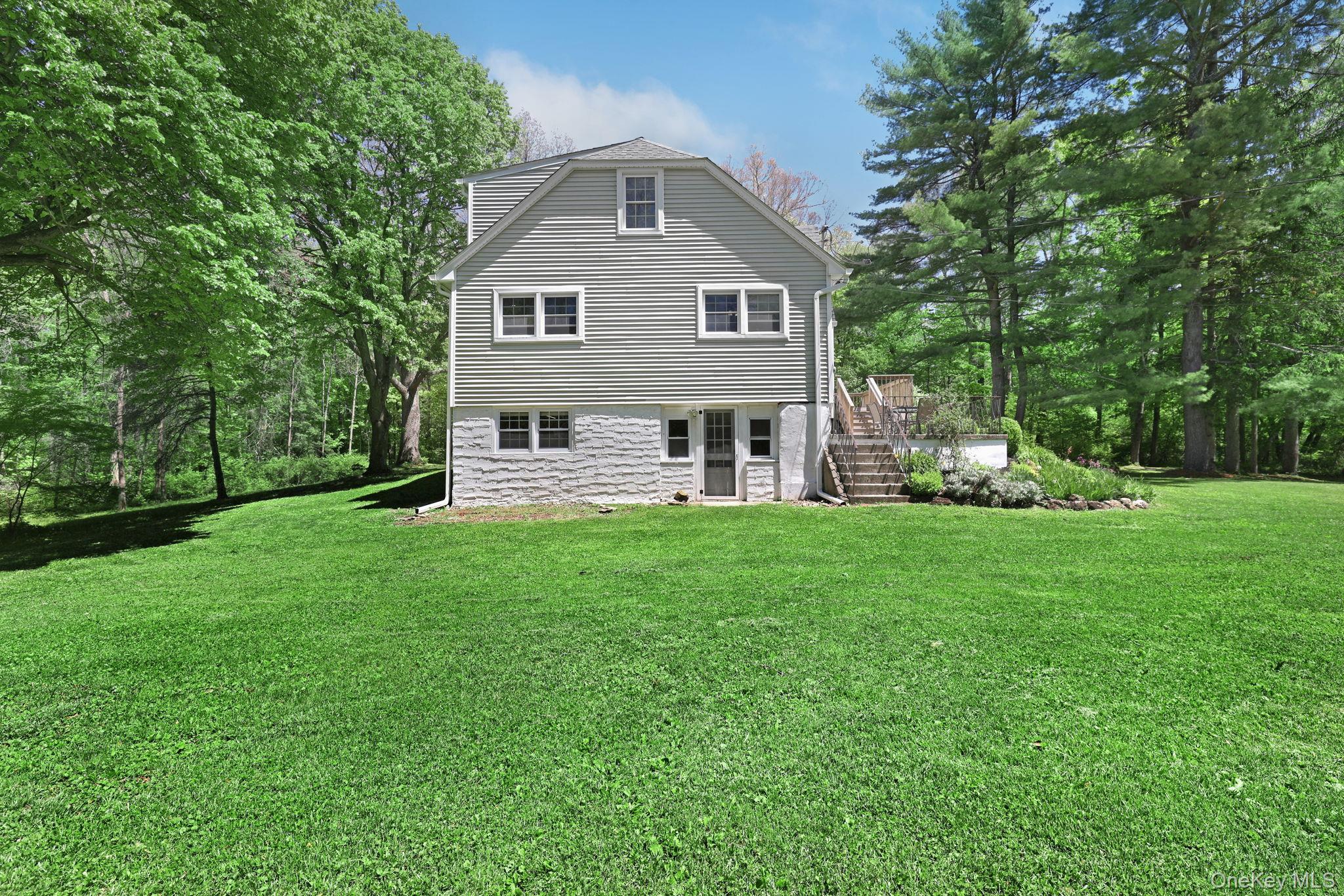 94 Smithtown Road Fishkill, NY 12524 - Photo 45 of 45 a front view of a house with garden and porch